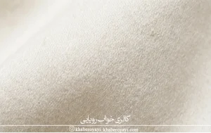 «نمای نزدیک بافت روبالشتی کتان ساتن با الیاف طبیعی و سطح نرم و لطیف» 